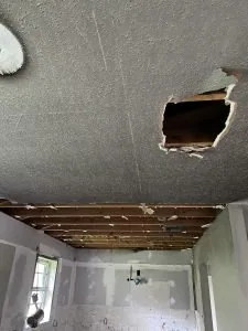Hole in ceiling of property